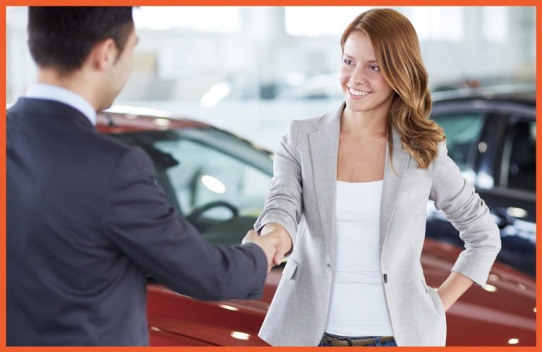 Equity Protection - Woman Shaking Hands at Car Dealer