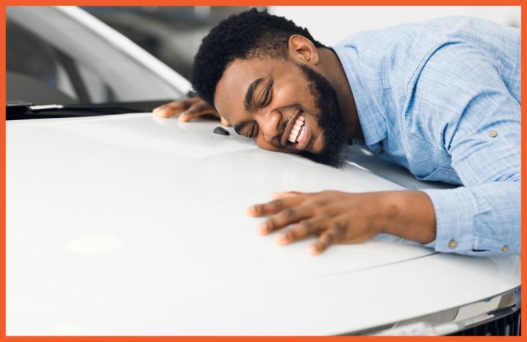 Man Smiling with Car